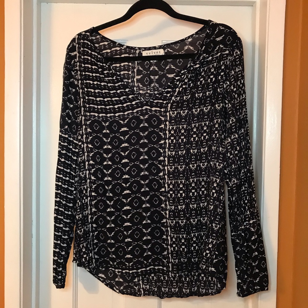 Long sleeve navy blue and white patterned shirt